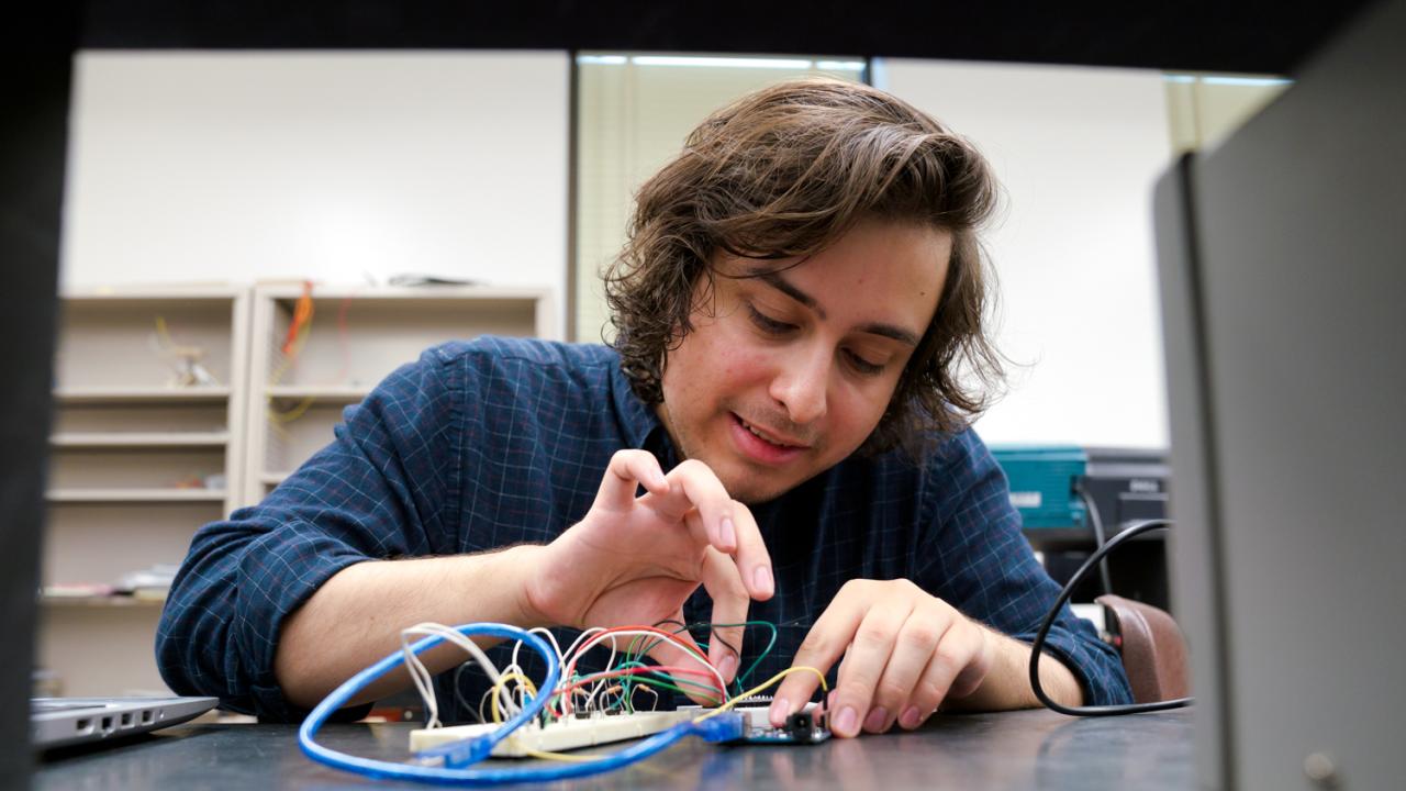 Students try their hand at high-tech fabrication in the UC Davis Department of Physics. Photo credit T.J. Ushing. Students try their hand at high-tech fabrication in the UC Davis Department of Physics. Photo credit T.J. Ushing.